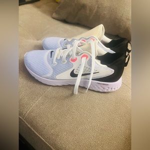 Nike running shoes with one lace